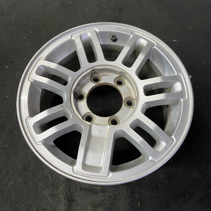 16" HUMMER H3 08 16x7.5, 7 double spoke, finish Original OEM Wheel Rim - Close-Up Detail