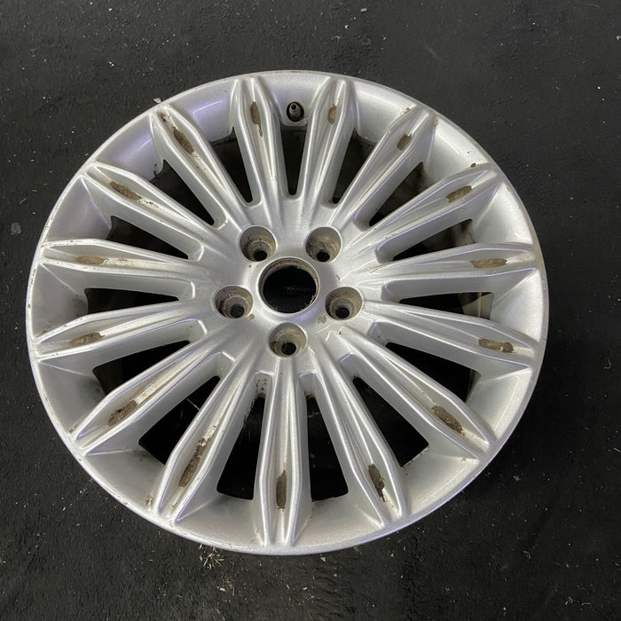 17" FUSION 13-16 17x7.5, , 15 spoke Original OEM Wheel Rim - Close-Up Detail
