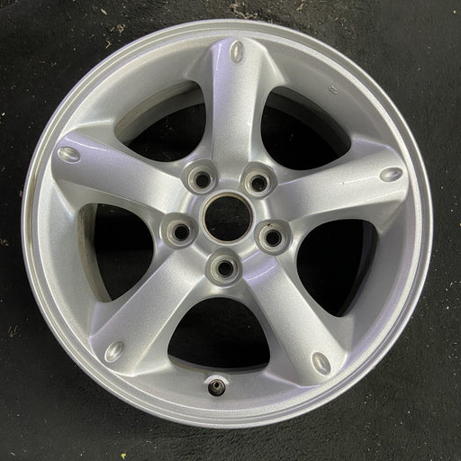16" MAZDA TRIBUTE 05-06 16x7, , oval dimples ends Original OEM Wheel Rim - Angle View