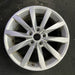 17" GOLF 17 17x7 , 10 spoke, 49mm offset, silver pockets Original OEM Wheel Rim - Angle View