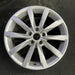 17" GOLF 17 17x7 , 10 spoke, 49mm offset, silver pockets Original OEM Wheel Rim - Angle View
