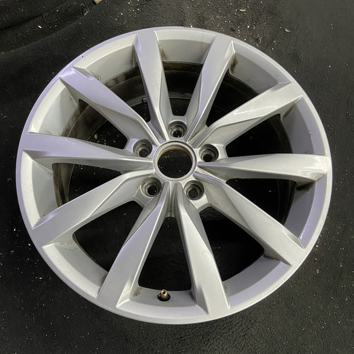 17" GOLF 17 17x7 , 10 spoke, 49mm offset, silver pockets Original OEM Wheel Rim - Side Profile