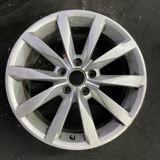17" GOLF 17 17x7 , 10 spoke, 49mm offset, silver pockets Original OEM Wheel Rim - Angle View