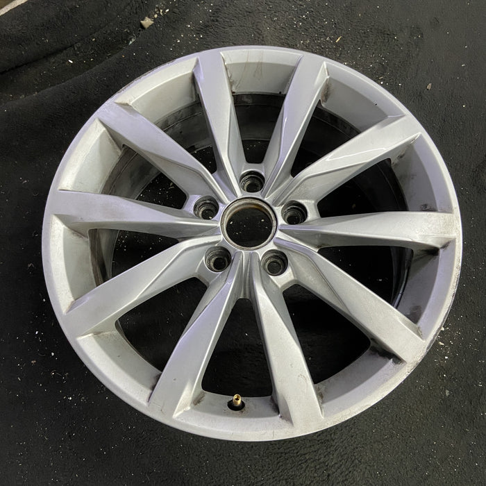 17" GOLF 17 17x7 , 10 spoke, 49mm offset, silver pockets Original OEM Wheel Rim - Side Profile