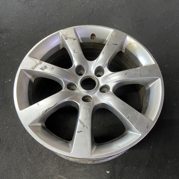 17" INFINITI G35 05-06 17x7 , 7 spoke Original OEM Wheel Rim - Close-Up Detail