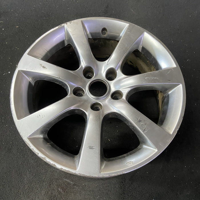 17" INFINITI G35 05-06 17x7 , 7 spoke Original OEM Wheel Rim - Close-Up Detail