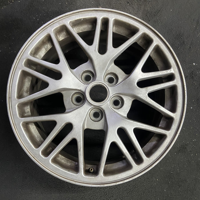 17" BONNEVILLE 00-01 17x7.5, 20 spoke Original OEM Wheel Rim - Angle View