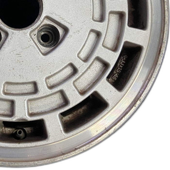 15" MAXIMA 85-86 15x6 alloy silver Original OEM Wheel Rim - Close-Up Detail