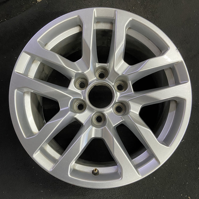 18" SIERRA 1500 PICKUP 19 , 18x8.5, 10 spoke, silver Original OEM Wheel Rim - Angle View