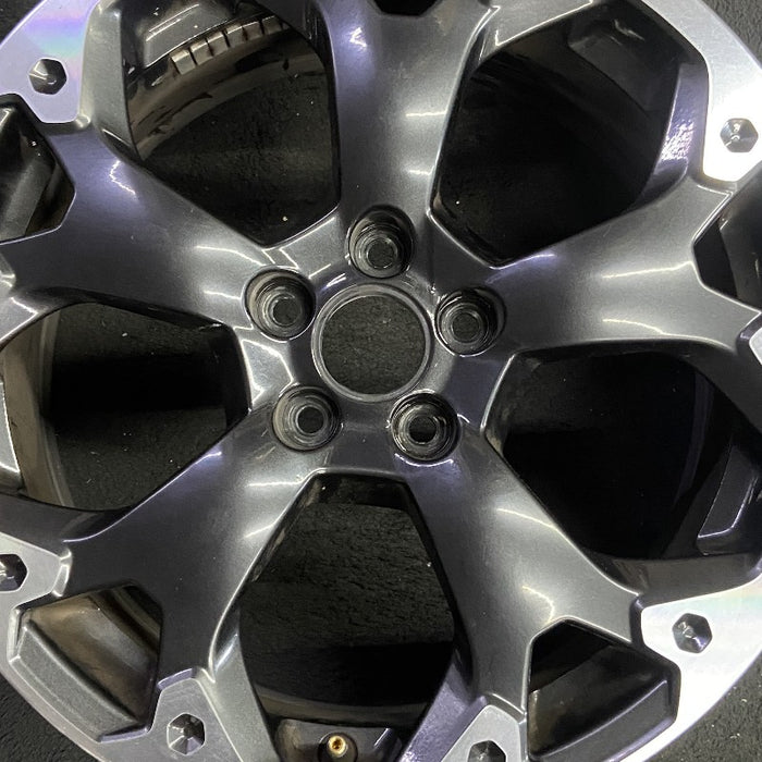 17" XV CROSSTREK 21 17x7 alloy machined face dark gray pockets outer machined - Angle View