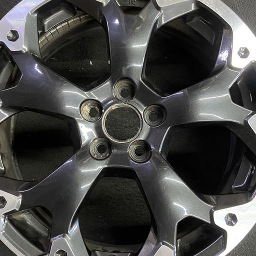17" XV CROSSTREK 21 17x7 alloy machined face dark gray pockets outer machined - Angle View