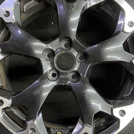 17" XV CROSSTREK 21 17x7 alloy machined face dark gray pockets outer machined - Angle View