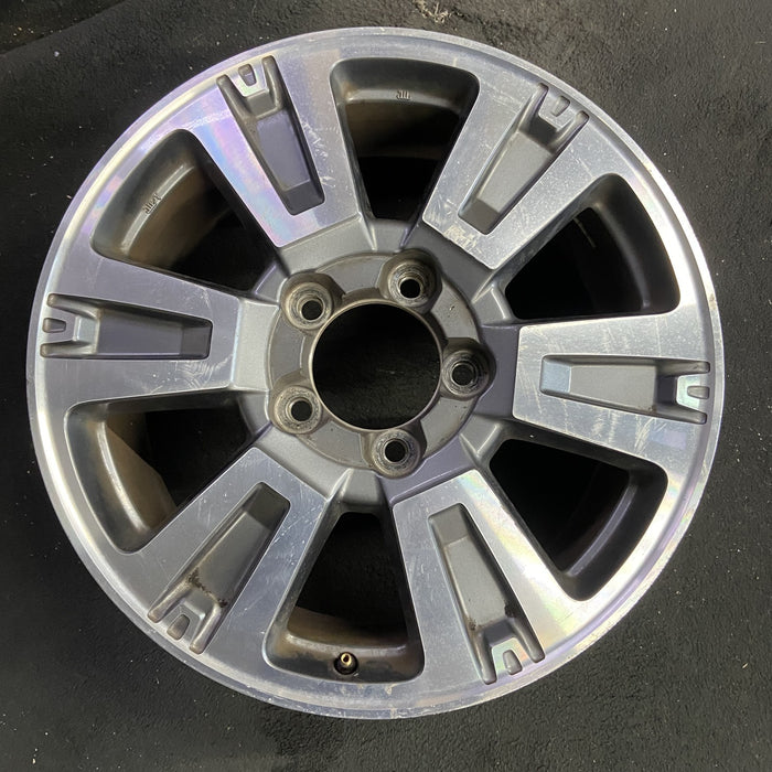 20" TUNDRA 18-21 20x8 , 6 spoke, exposed lug nuts, gray inlay Original OEM - Angle View
