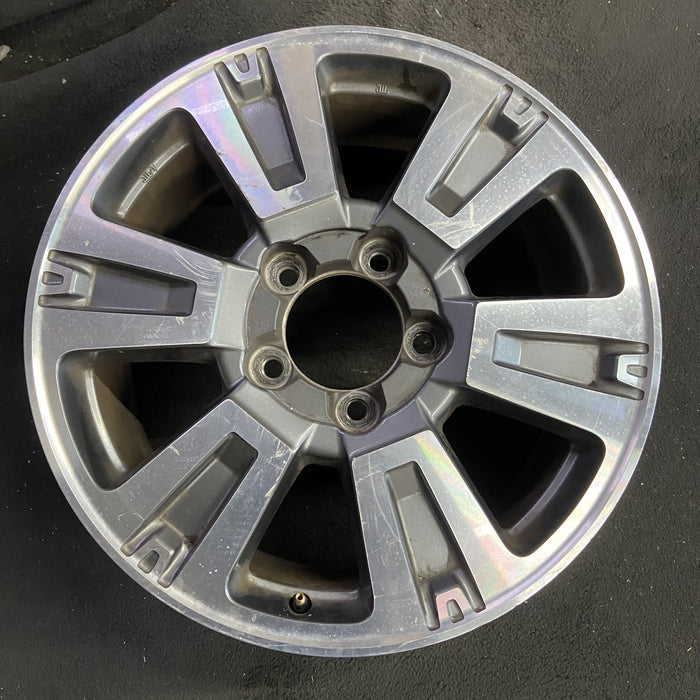 20" TUNDRA 18-21 20x8 , 6 spoke, exposed lug nuts, gray inlay Original OEM - Angle View