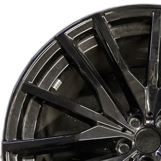 22" BMW X5 21-25 22x10.5 15 spoke black Original OEM Wheel Rim - Angle View
