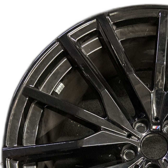 22" BMW X5 21-25 22x10.5 15 spoke black Original OEM Wheel Rim - Angle View