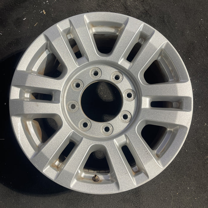 18" FORD F250SD PICKUP 17 18x8 , aluminum, 12 spoke , silver Original OEM Wheel - Angle View