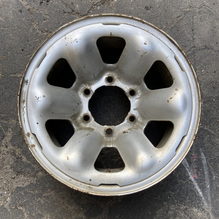 15" 4 RUNNER 90-91 15x7, steel Original OEM Wheel Rim - Angle View