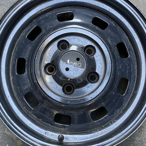 15" CHEROKEE 84-86 15x6 steel ly Original OEM Wheel Rim - Angle View