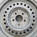 15" CARAVAN 96-00 15x6.5, steel Original OEM Wheel Rim - Angle View