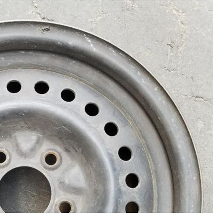 15" CARAVAN 96-00 15x6.5, steel Original OEM Wheel Rim - Close-Up Detail