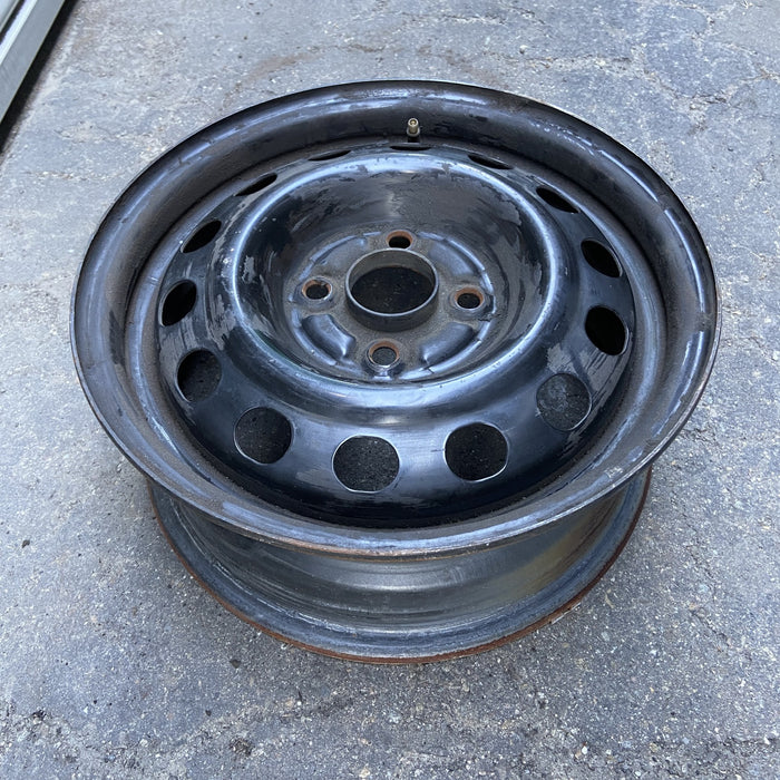 14" COLT 94-96 14x5.5, steel Original OEM Wheel Rim - Close-Up Detail