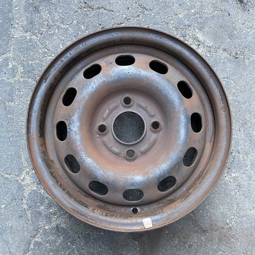 14" CONTOUR 95-97 14x5.5, steel Original OEM Wheel Rim - Angle View
