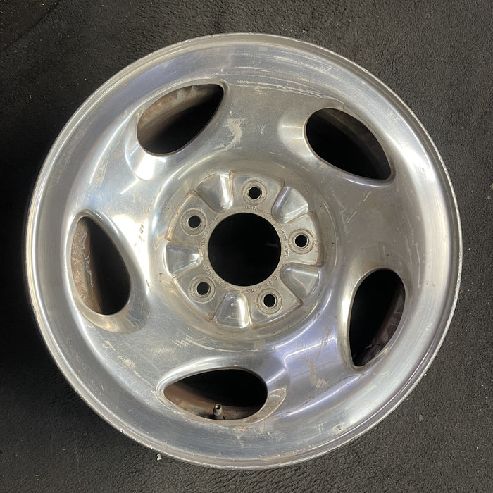 16" FORD F150 PICKUP 00 12mm lugs , 16x7, aluminum, 5 ovals spokes Original OEM - Angle View