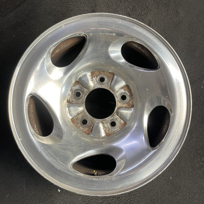 16" FORD F150 PICKUP 00 12mm lugs , 16x7, aluminum, 5 ovals spokes Original OEM - Angle View