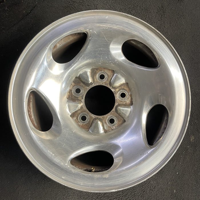 16" FORD F150 PICKUP 00 12mm lugs , 16x7, aluminum, 5 ovals spokes Original OEM - Angle View