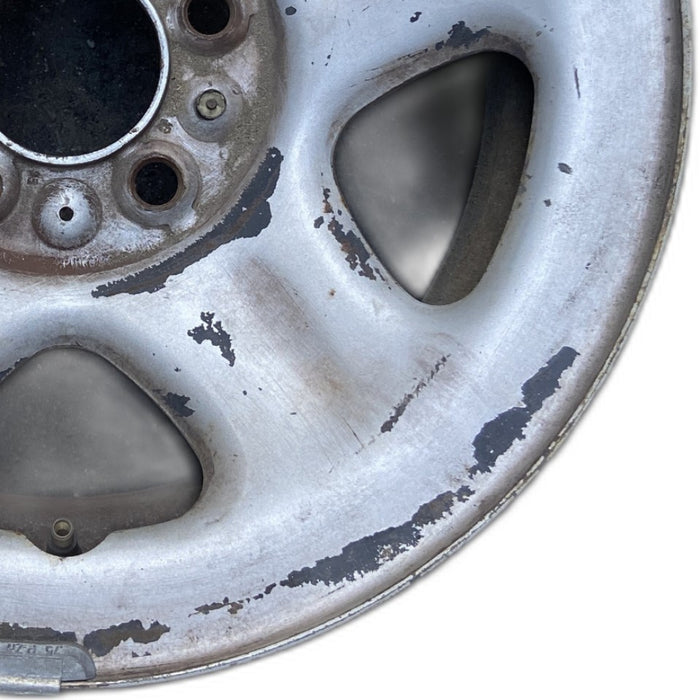 15" CHEROKEE 93-94 15x7 steel 5 spoke dimpled spokes Original OEM Wheel Rim - Close-Up Detail