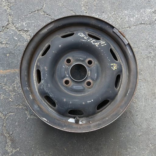 13" CELICA 86-87 13x5.5, steel, 9 hole Original OEM Wheel Rim - Angle View