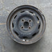 13" CELICA 86-87 13x5.5, steel, 9 hole Original OEM Wheel Rim - Angle View