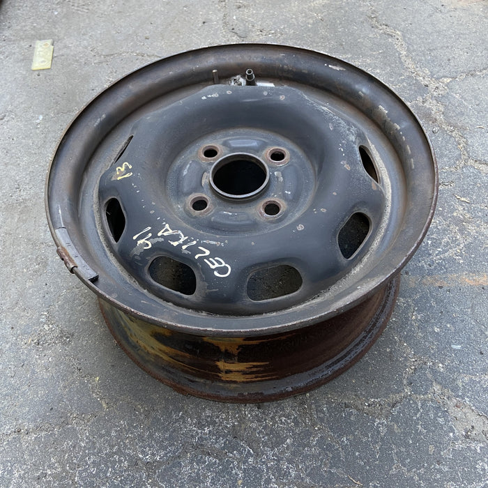13" CELICA 86-87 13x5.5, steel, 9 hole Original OEM Wheel Rim - Close-Up Detail