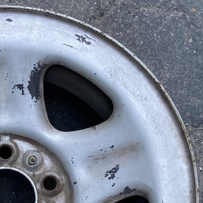 15" CHEROKEE 93-94 15x7 steel 5 spoke dimpled spokes Original OEM Wheel Rim - Close-Up Detail