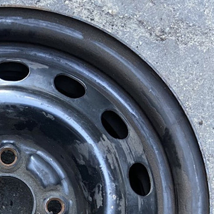 14" COLT 94-96 14x5.5, steel Original OEM Wheel Rim - Close-Up Detail