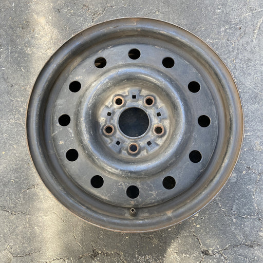15" TAURUS 94-95 15x6, steel, w/police package Original OEM Wheel Rim - Angle View