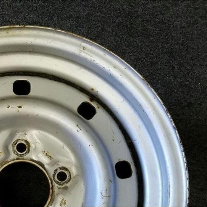 16" EXPEDITION 00 12mm lugs , 16x7, steel, 9 small holes Original OEM Wheel Rim - Close-Up Detail