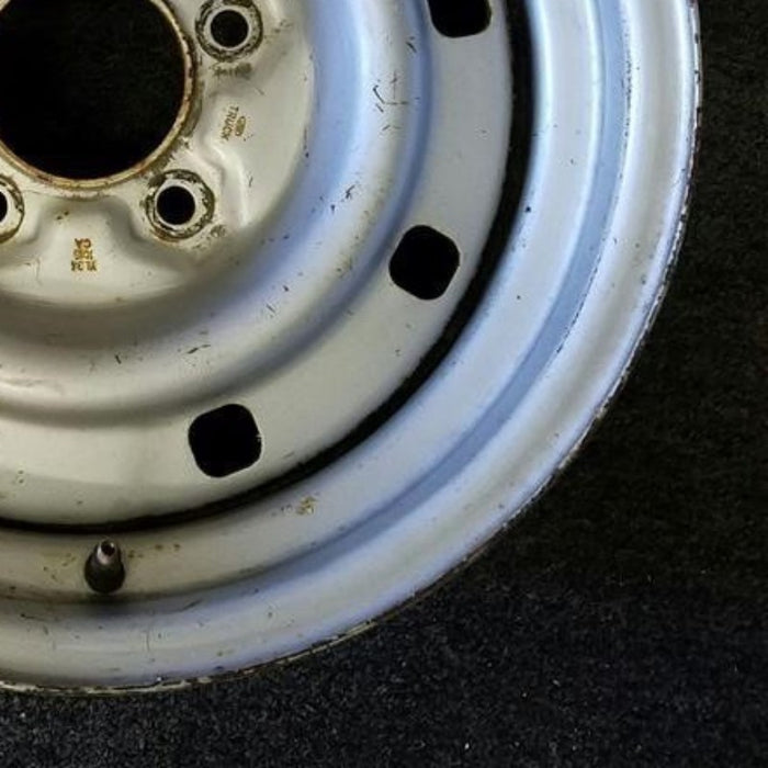 16" EXPEDITION 00 12mm lugs , 16x7, steel, 9 small holes Original OEM Wheel Rim - Back View