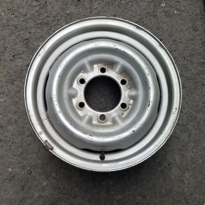 15" 4 RUNNER 86-88 15x6 silver Deluxe Original OEM Wheel Rim - Front View