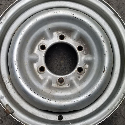 15" 4 RUNNER 86-88 15x6 silver Deluxe Original OEM Wheel Rim - Angle View