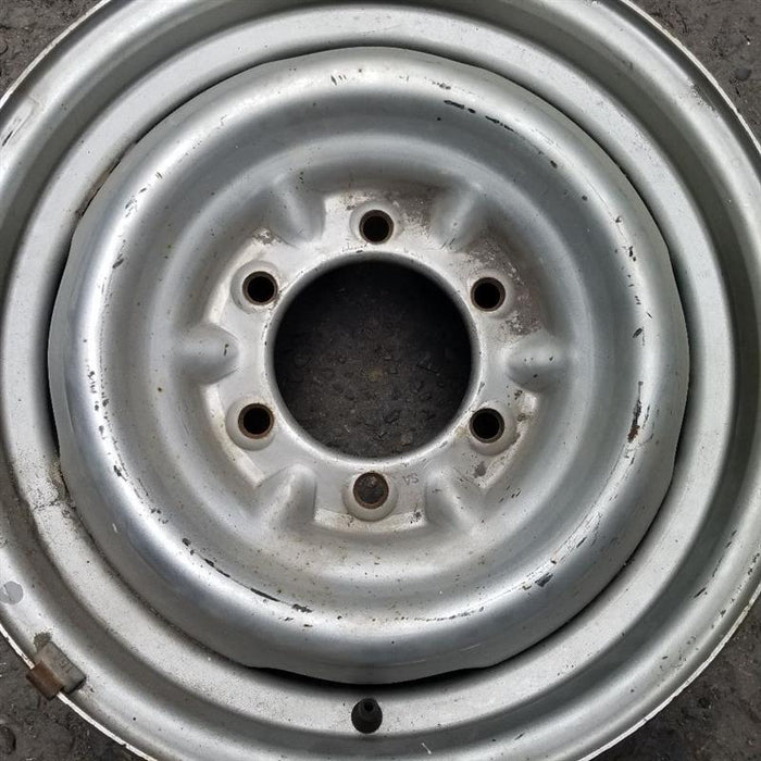 15" 4 RUNNER 86-88 15x6 silver Deluxe Original OEM Wheel Rim - Angle View