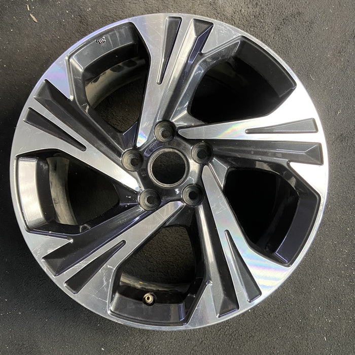 17" XV CROSSTREK 24-25 17x7 , , angled spoke, machined face with pockets - Angle View