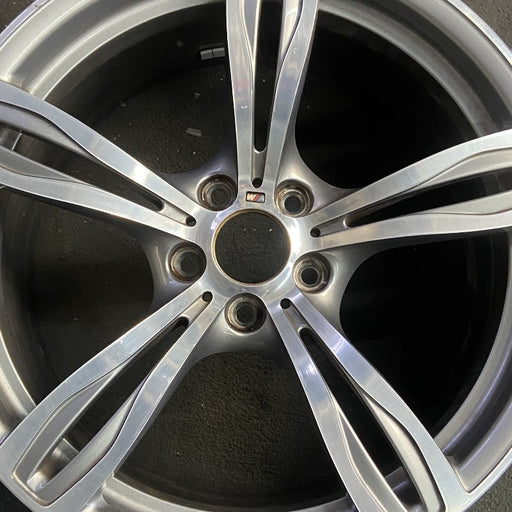 20" BMW M5 12-16 20x9 alloy 5 double spoke frt narrow opening in spoke silver - Angle View