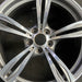 20" BMW M5 12-16 20x9 alloy 5 double spoke frt narrow opening in spoke silver - Angle View