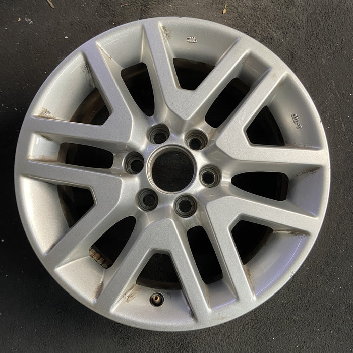 16" FRONTIER 14-21 16x7, alloy , open V spoke Original OEM Wheel Rim - Angle View