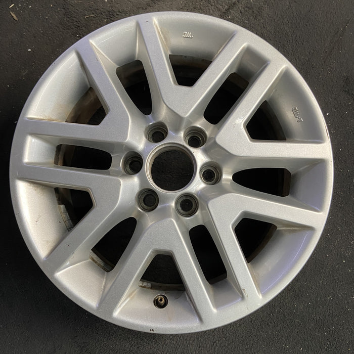 16" FRONTIER 14-21 16x7, alloy , open V spoke Original OEM Wheel Rim - Angle View