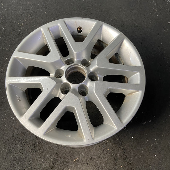 16" FRONTIER 14-21 16x7, alloy , open V spoke Original OEM Wheel Rim - Close-Up Detail