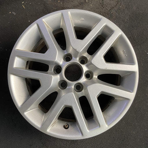 16" FRONTIER 14-21 16x7, alloy , open V spoke Original OEM Wheel Rim - Angle View