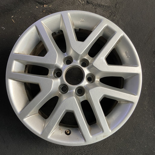 16" FRONTIER 14-21 16x7, alloy , open V spoke Original OEM Wheel Rim - Angle View